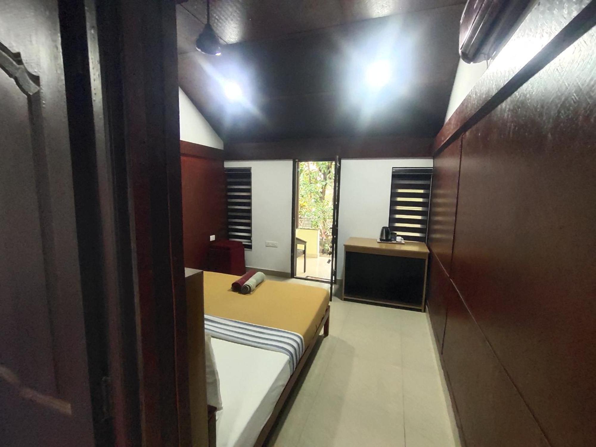 ורקלה Savithri Inn Cottage חדר תמונה